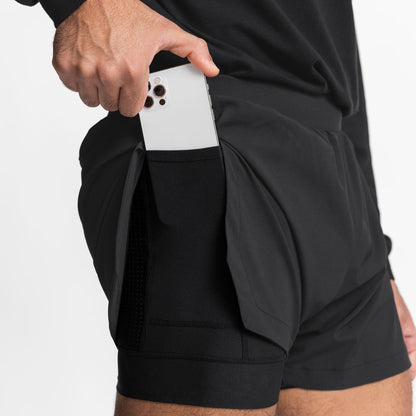 Pantalones cortos deportivos elásticos para gimnasio para hombres musculosos